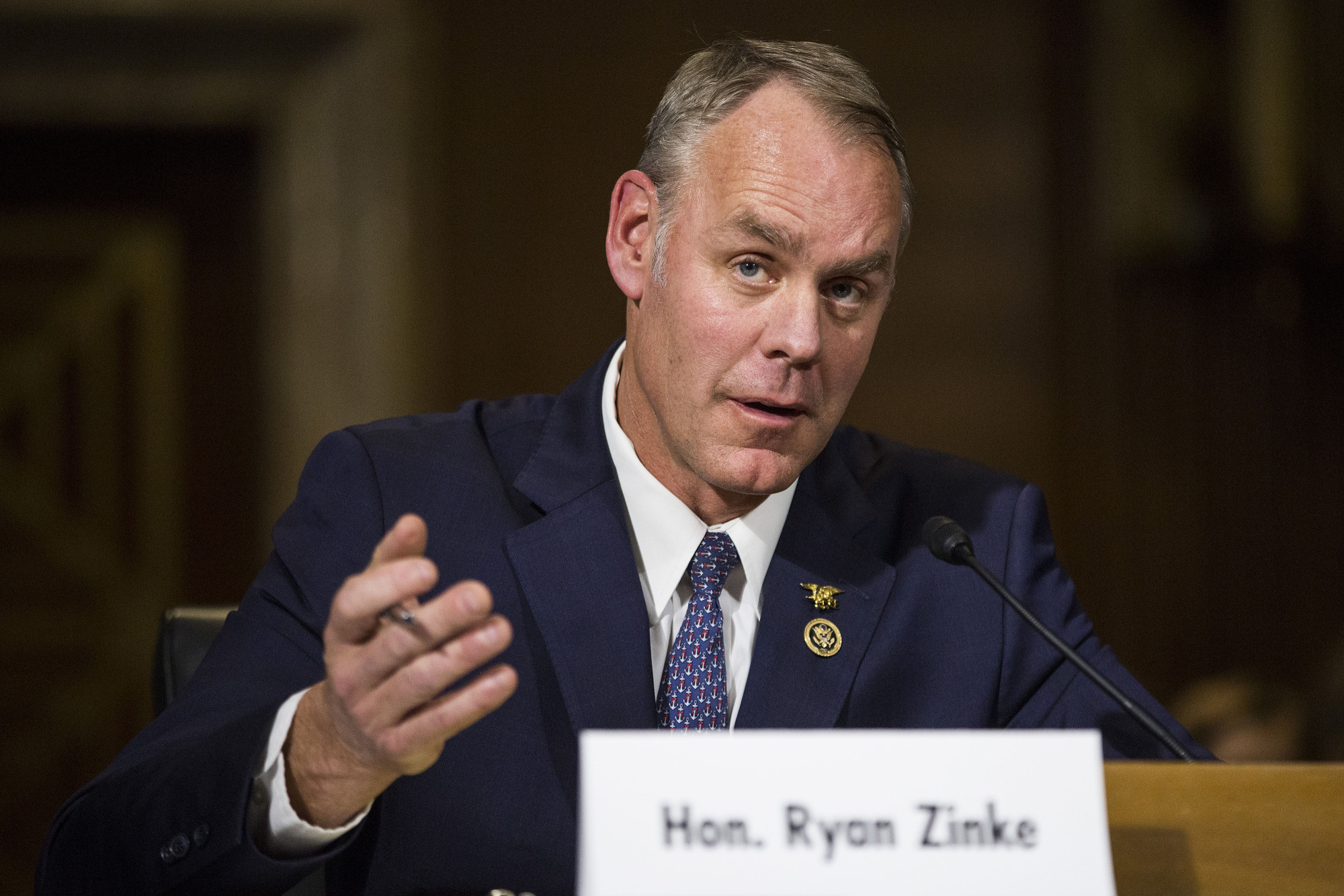 Zinke Loves Interior Post, Even With 2 a.m. Calls From Trump Bloomberg