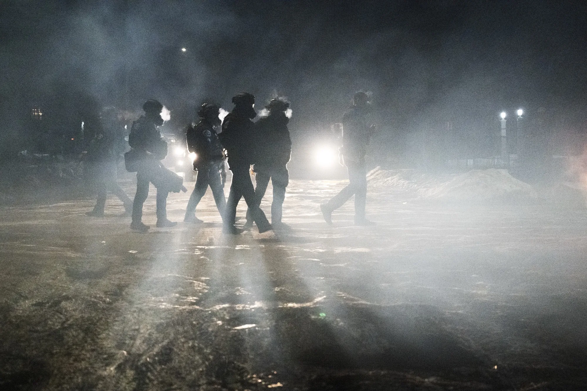 Federal law enforcement officers during confrontations with residents following a shooting incident in Minneapolis on Jan. 15.