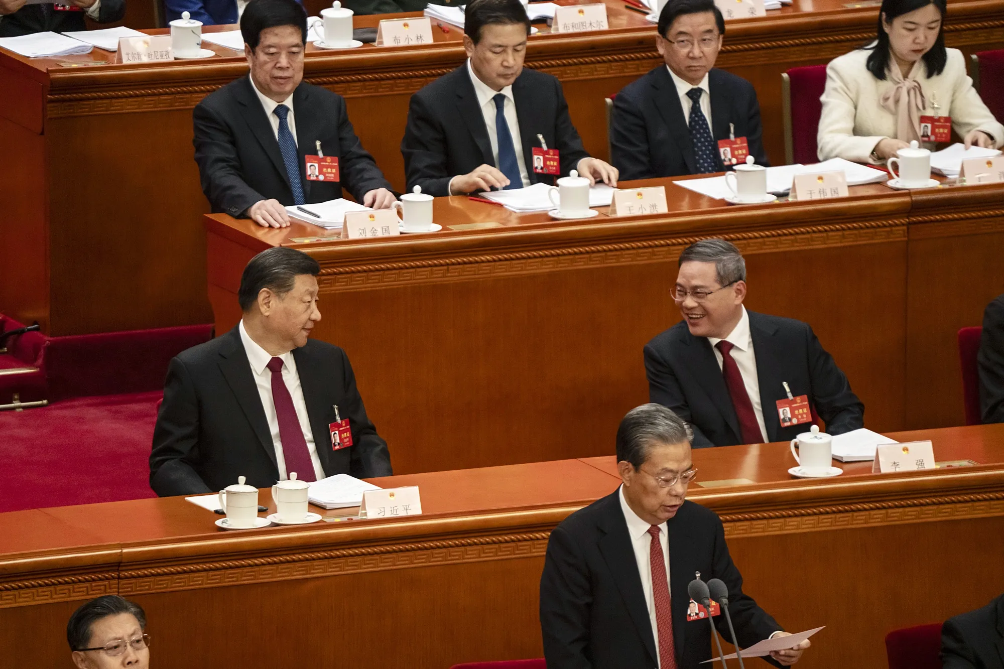 Chinese President Xi Jinping speaks with Premier Li Qiang during the 14th National People’s Congress in Beijing in March.