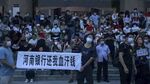A protest at the entrance to a branch of China's central bank in&nbsp;Henan Province on July 10.