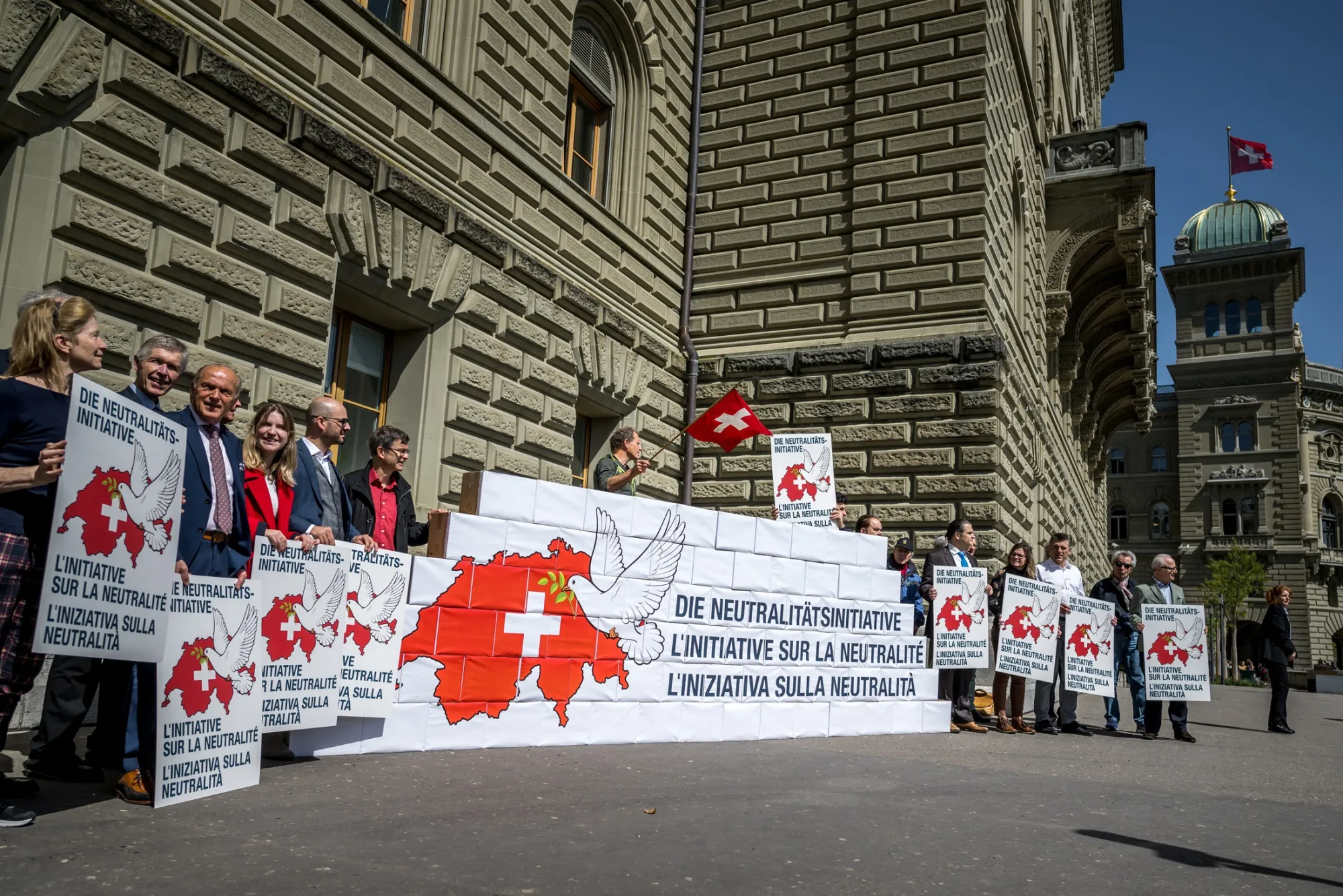 Supporters during the handover of signatures supporting neutrality, in Bern on April 11.
