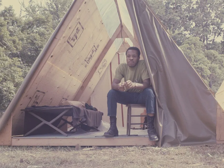 A resident of Resurrection City sits in his shelter. 