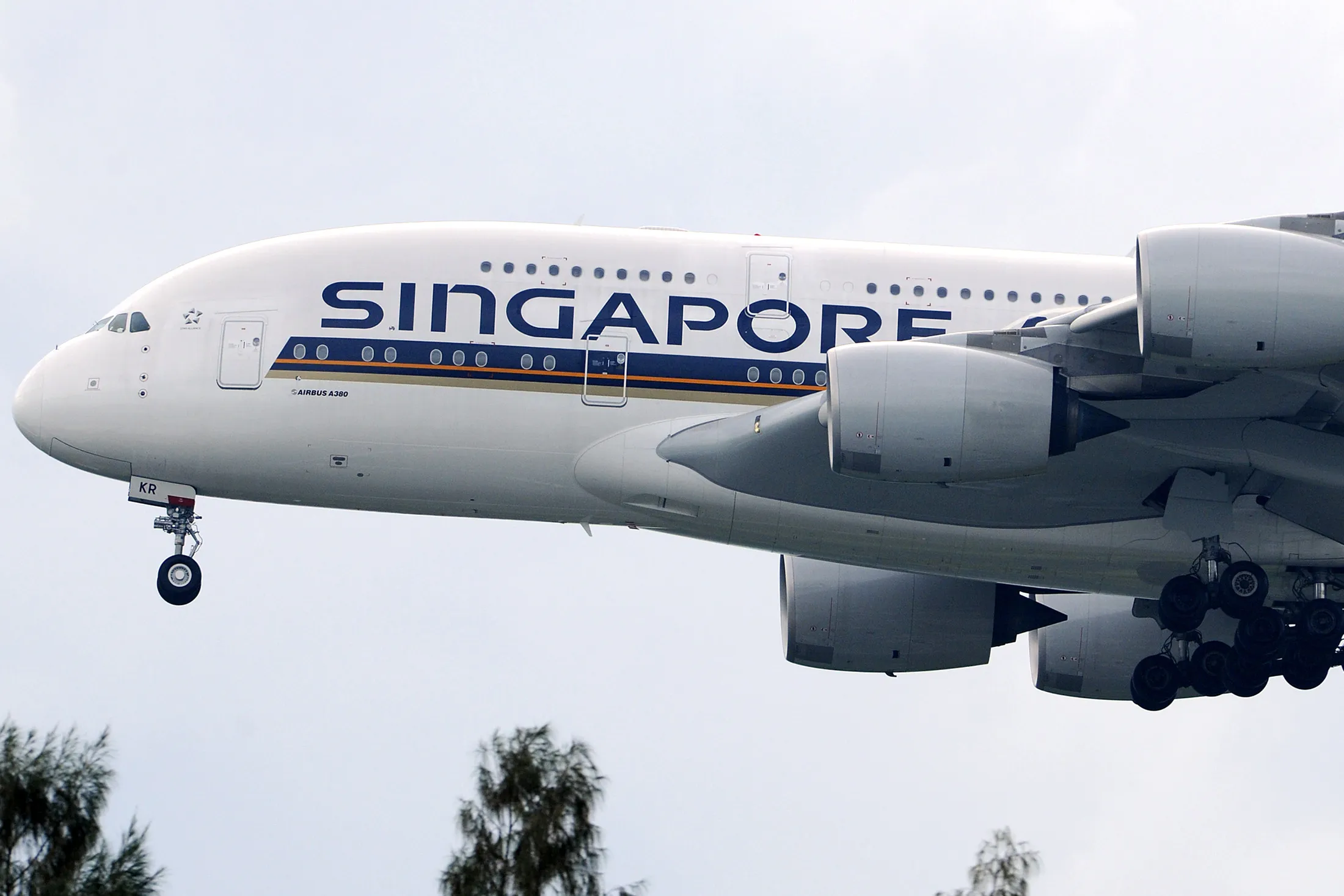 A Singapore Airlines Airbus SAS A380 aircraft prepares to land at Changi Airport in Singapore.
