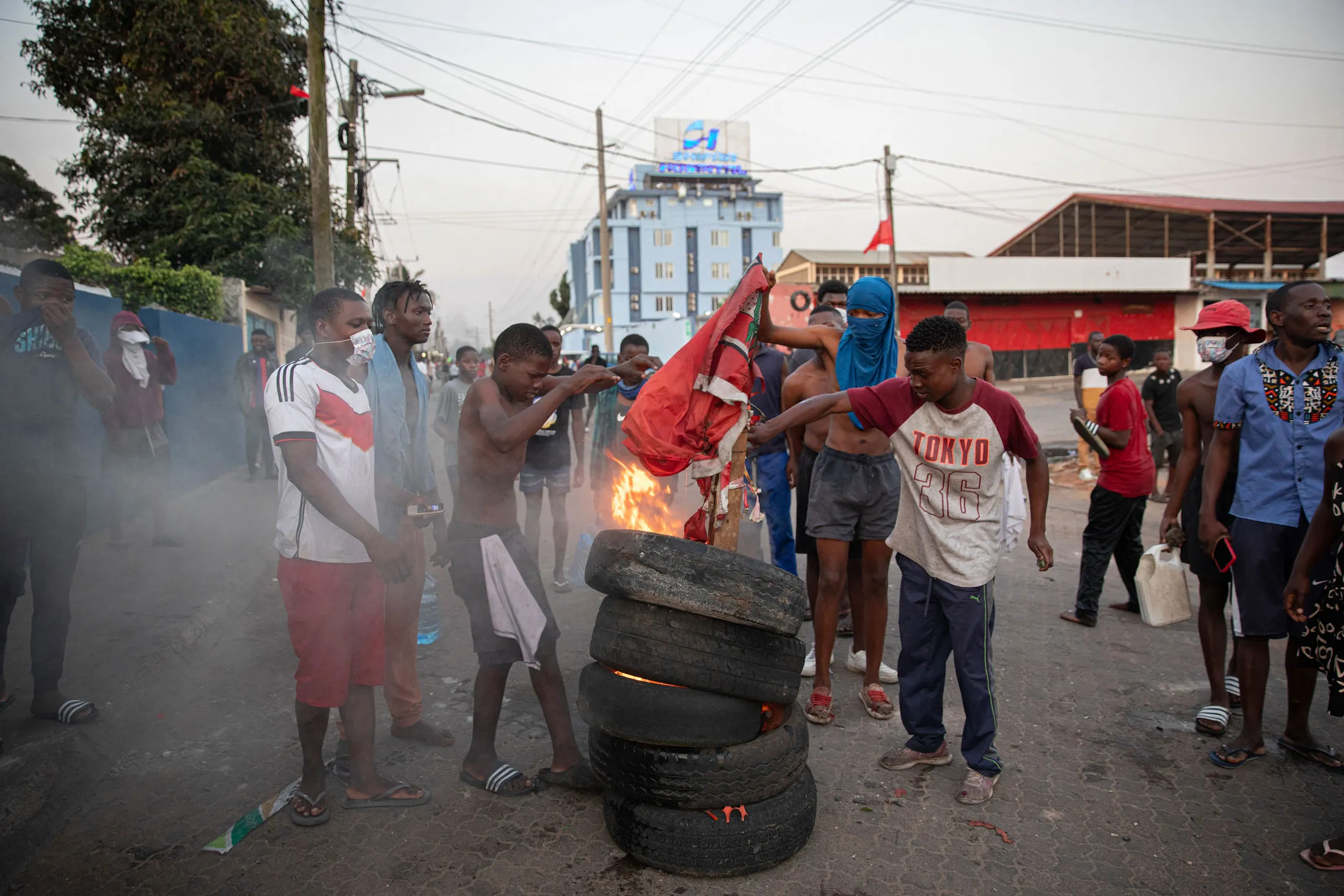 Protesters set fire to tires in Maputo, Mozambique, on Oct. 24.