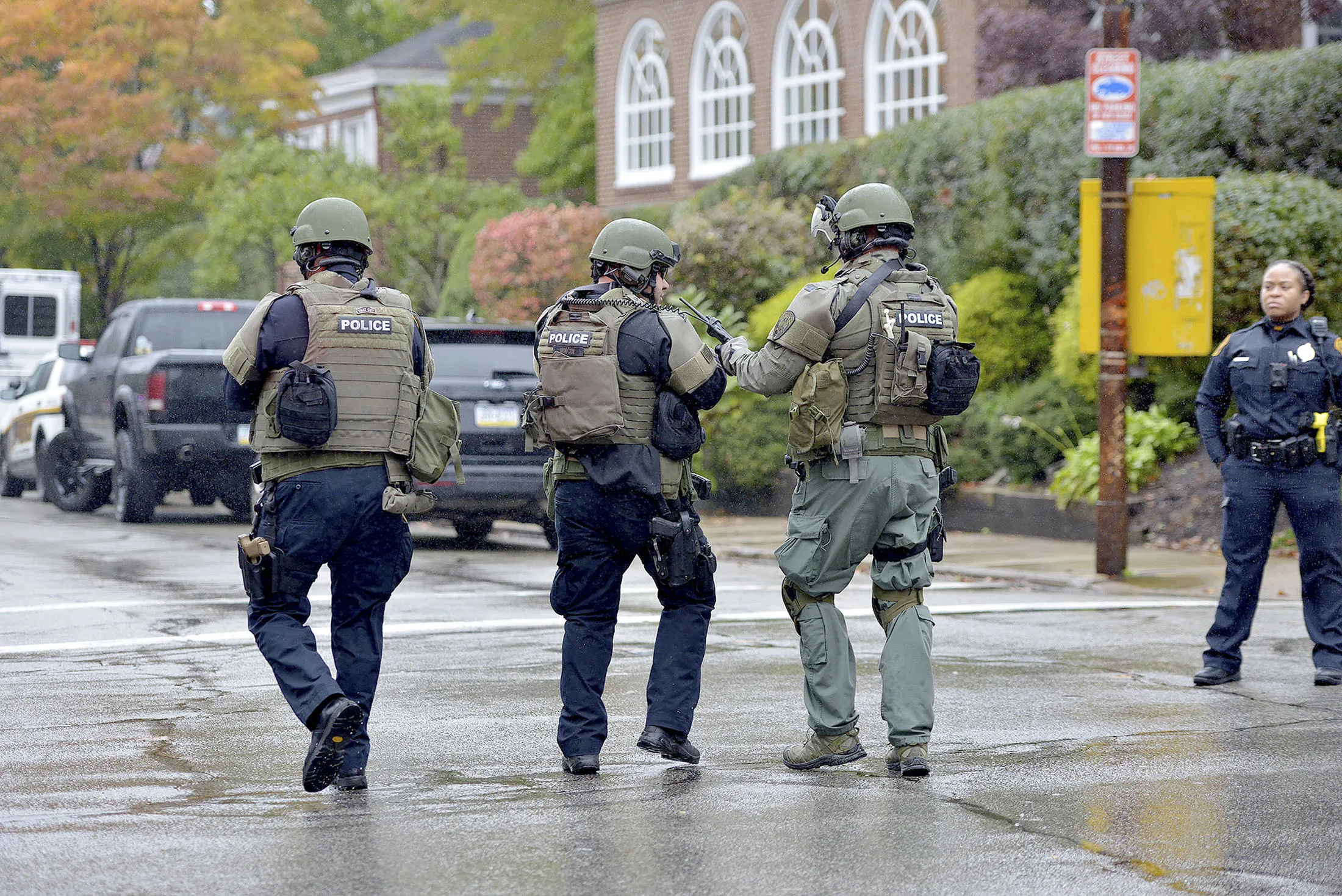 Polikce respond to an active shooter situation at the Tree of Life synagogue on Wildins Avenue in the Squirrel Hill neighborhood of Pittsburgh, Pa., on Saturday, October 27, 2018.