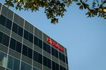 Signage is displayed outside McAfee Corp. headquarters in Santa Clara, California, U.S., on Tuesday, Sept. 29, 2020.