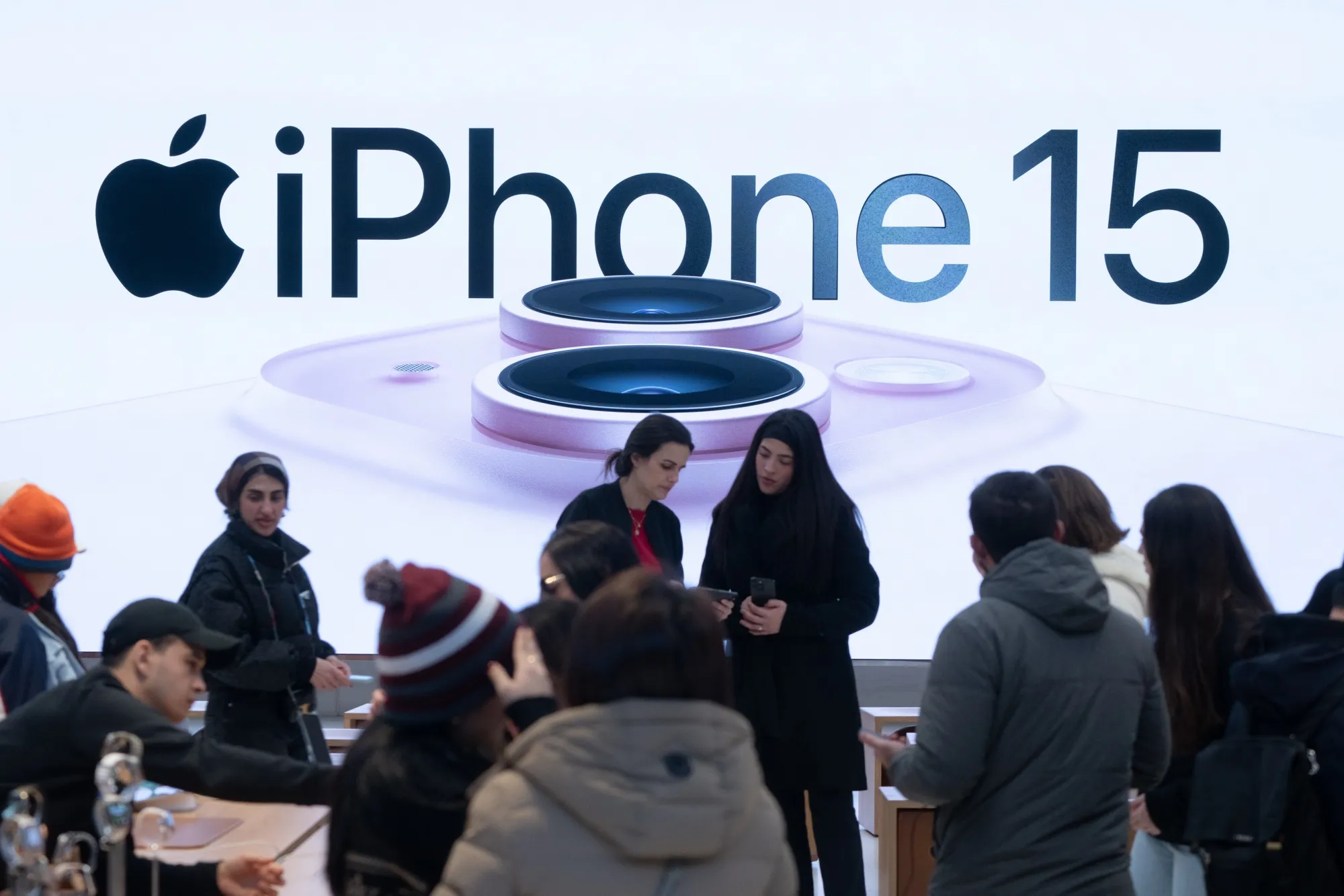 Apple iPhone 15 smartphone signage at the company's 5th Avenue store in New York.
