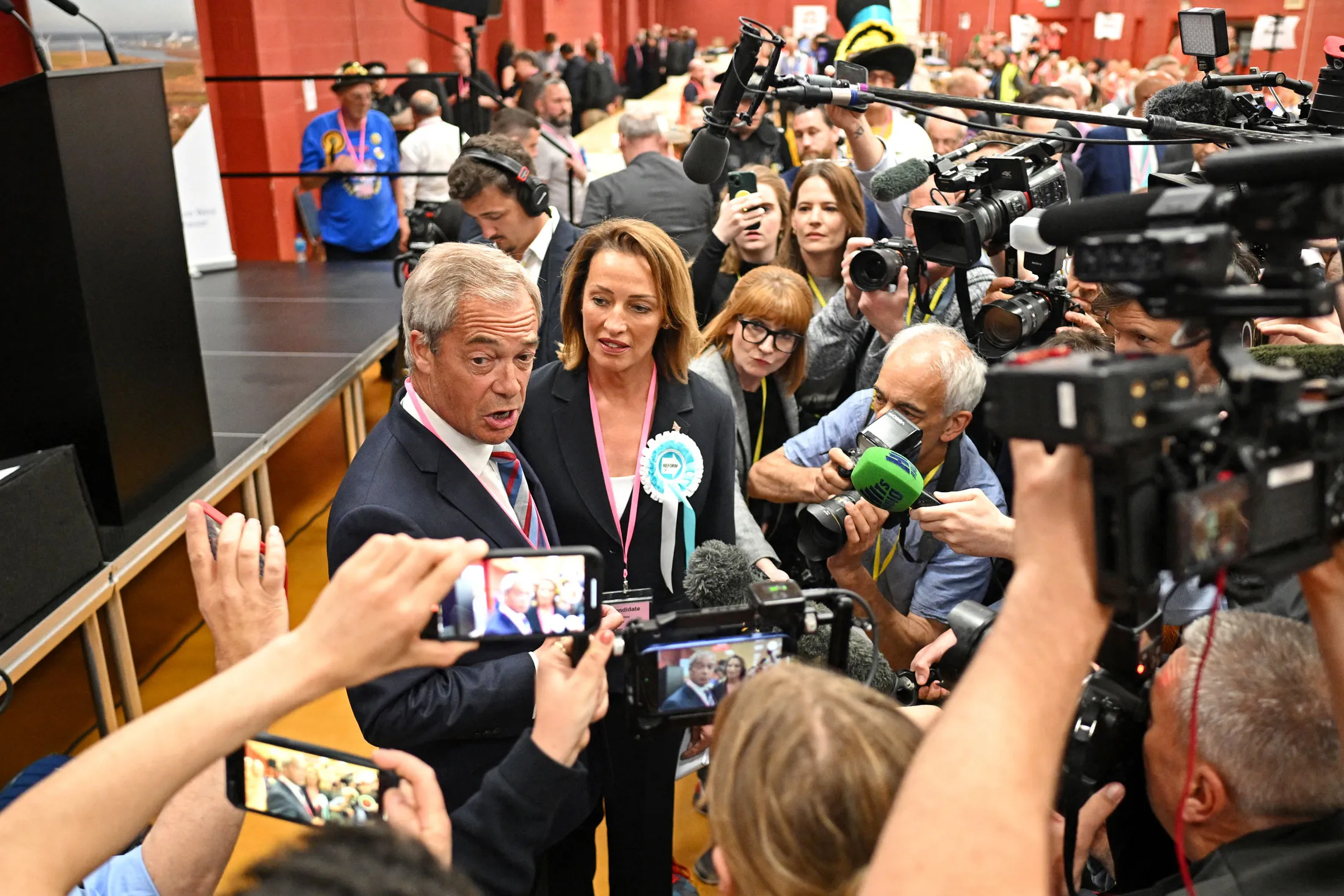 Nigel Farage, left, with Reform UK candidate Sarah Pochin in Widnes, UK, on May 2.