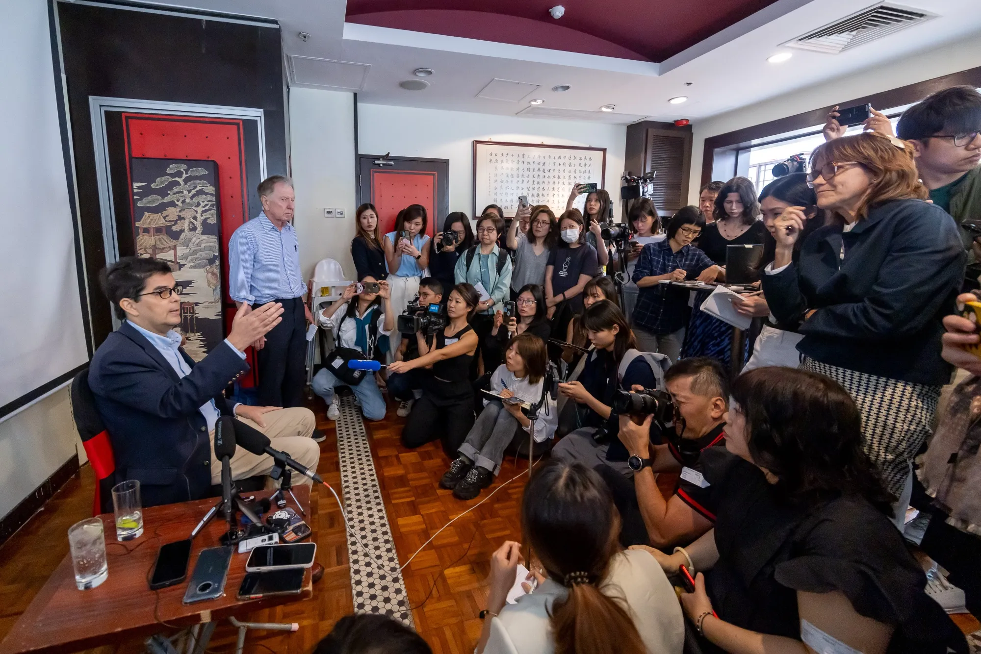 David Webb speaks to the media following the lunch event on May 12.