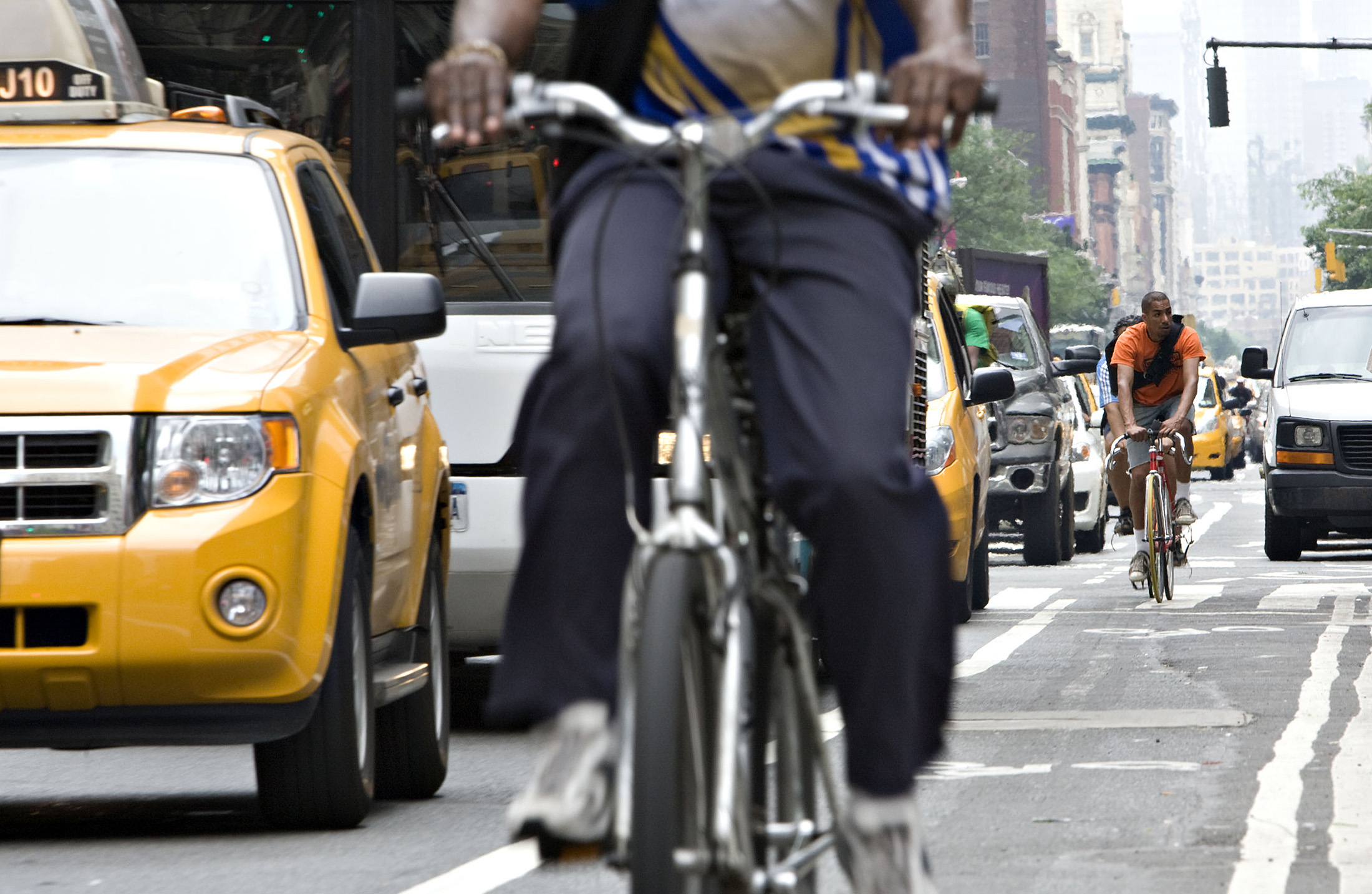Bicyclists ride in New York.
