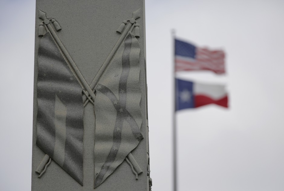 The Confederate flag is seen on a monument to Hood's Texas Brigade at the Texas State Capitol—just one of the many Confederate monuments in Texas.