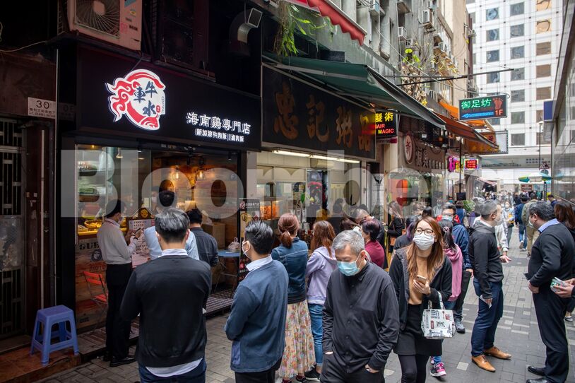 Officers Workers In Hong Kong's Central Business District As Stocks Priced Near All-Time Low