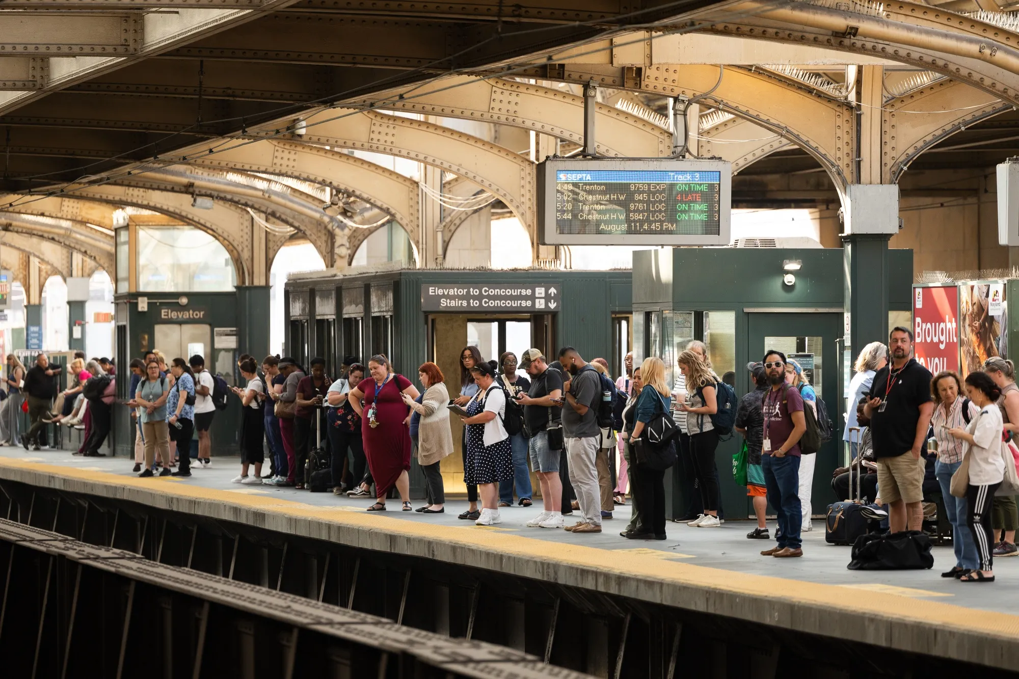 Commuters on a SEPTA train platform at 30th Street Station in Philadelphia on&nbsp;Aug. 11.