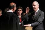 Surrounded by his family, New Jersey Gov.-elect Phil Murphy, right, takes the oath of office during a ceremony in Trenton, N.J., on&nbsp;Jan. 16.&nbsp;