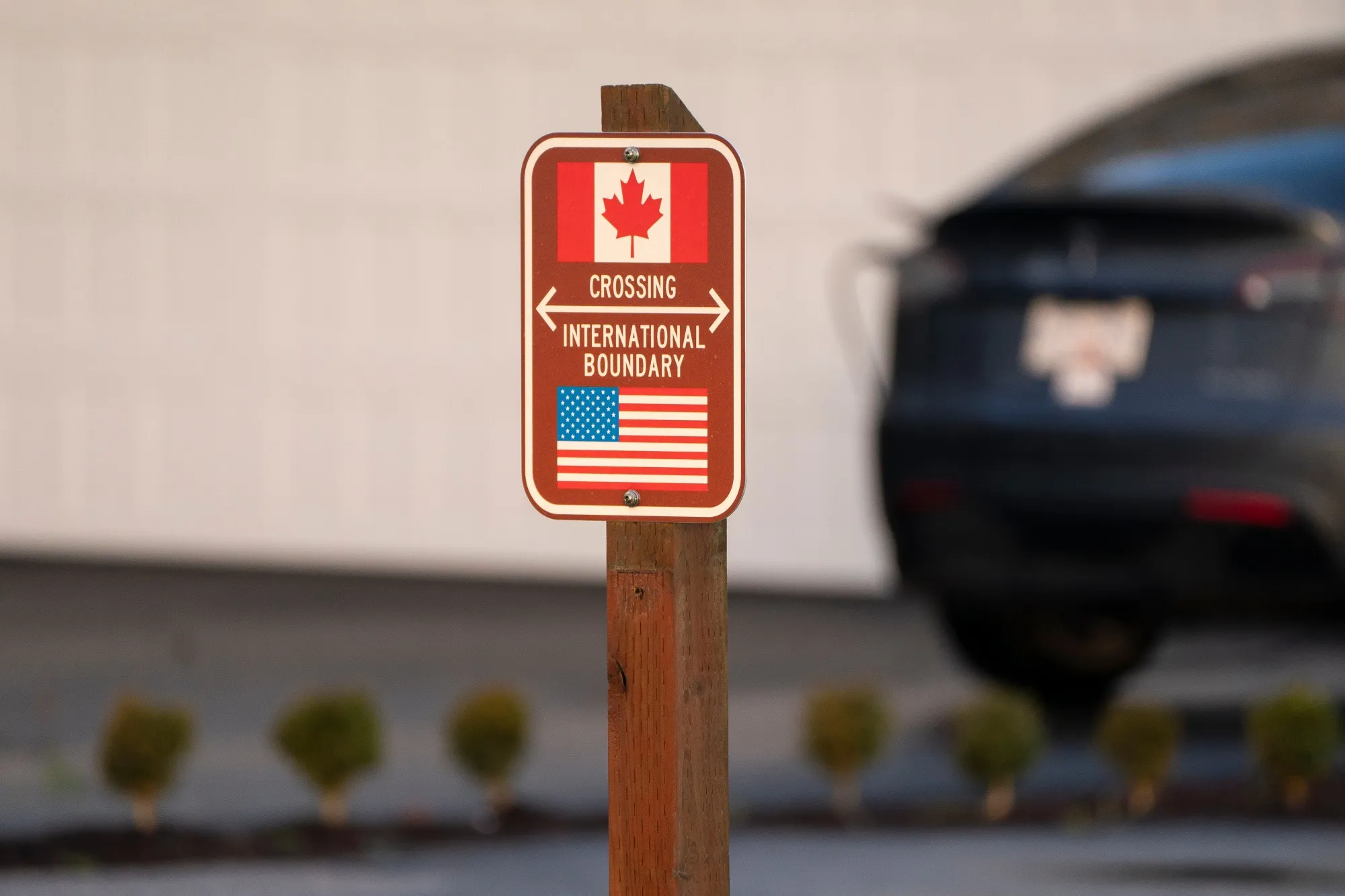 A sign marks the international boundary between Canada and the United States in Blaine, Washington, US.