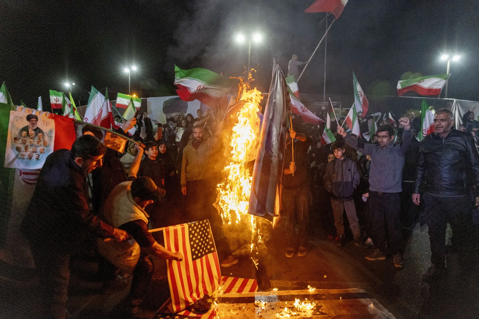 Iranians set fire to flags of the United States and Israel&nbsp;in Tehran, on March 17.