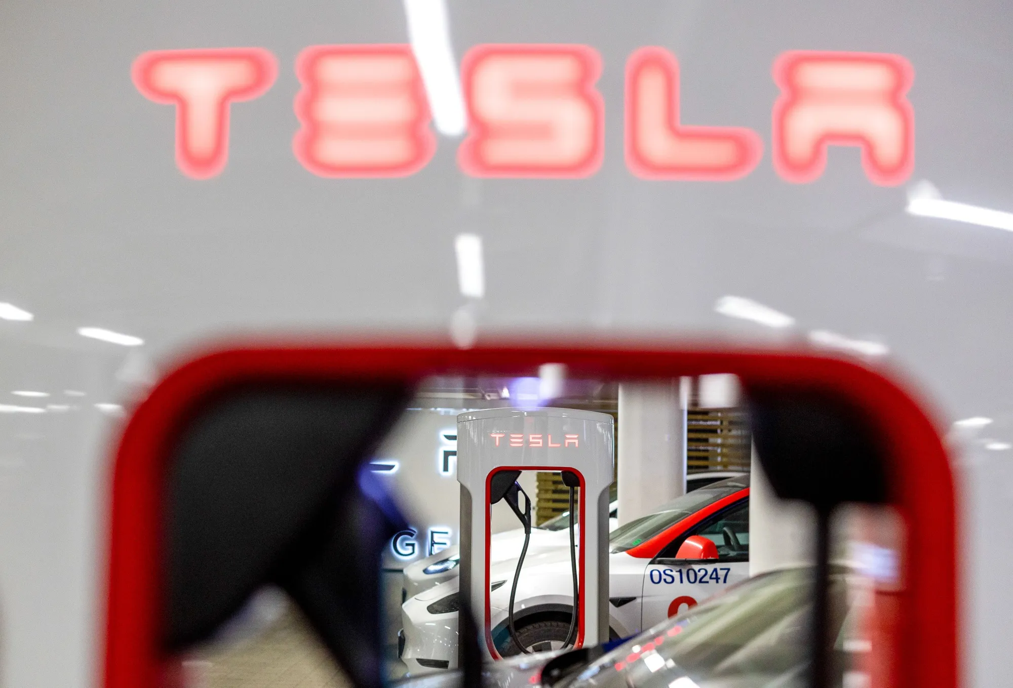 Electric vehicles charge at a Tesla supercharger point at Ullevaal stadium in Oslo.