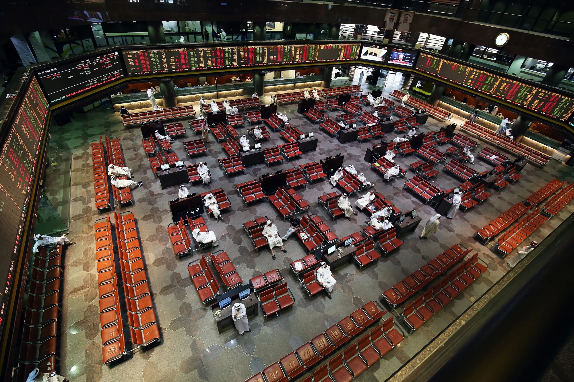 Traders follow the stock market at the Kuwait Stock Exchange&nbsp;in Kuwait.