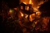 Thousands Flee From Uncontrolled Wildfires Burning Near LA