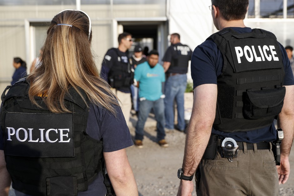An immigration raid in in Castalia, Ohio, in June.