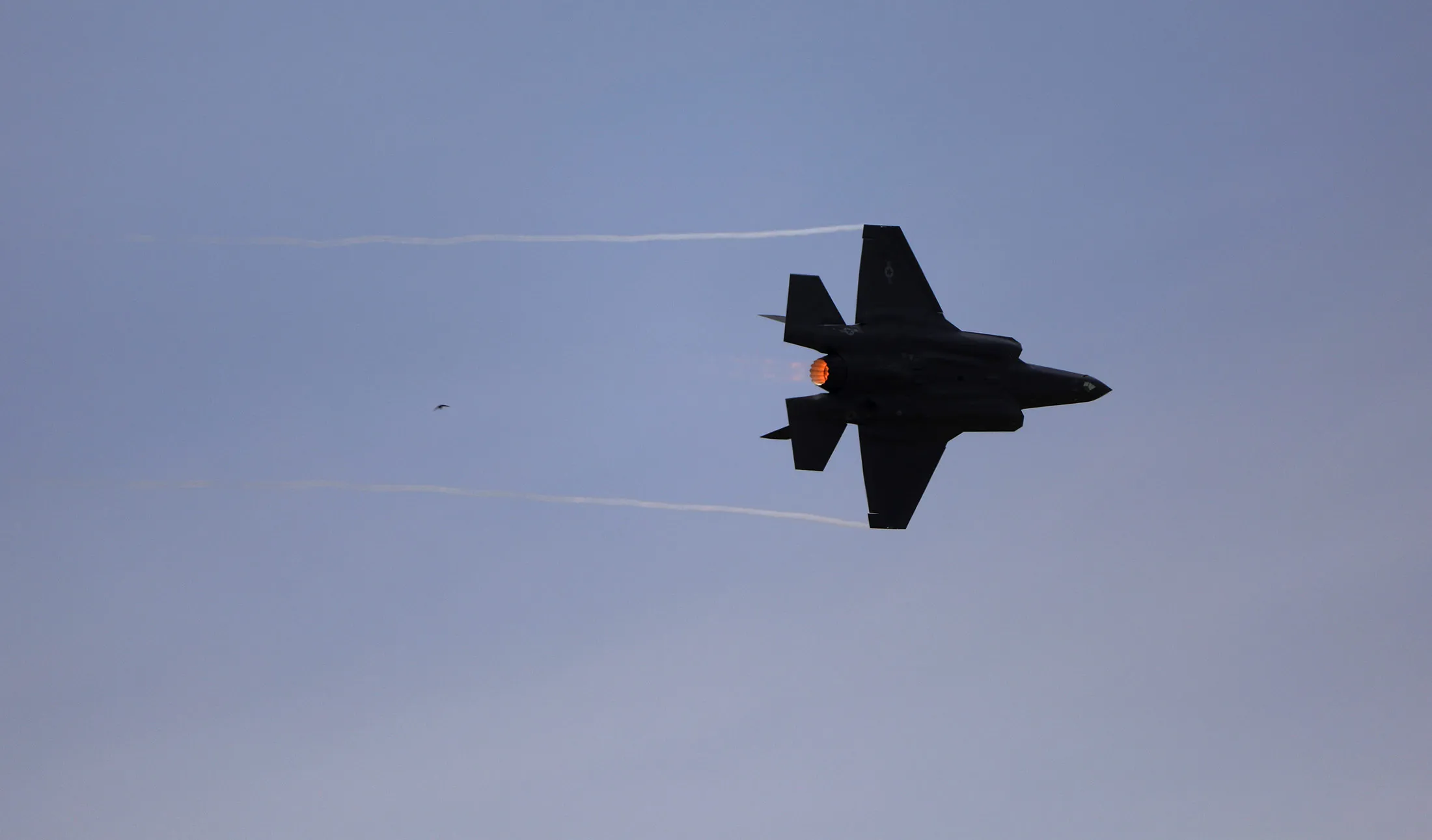 An F-35A fighter jet, manufactured by Lockheed Martin Corp., performs aerial maneuvers in Paris on June 20, 2017.
