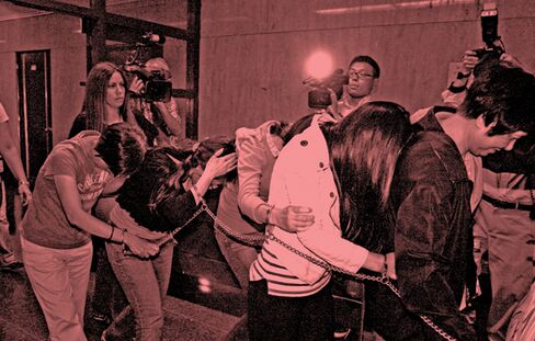 Former bank employees are indicted, May 2012