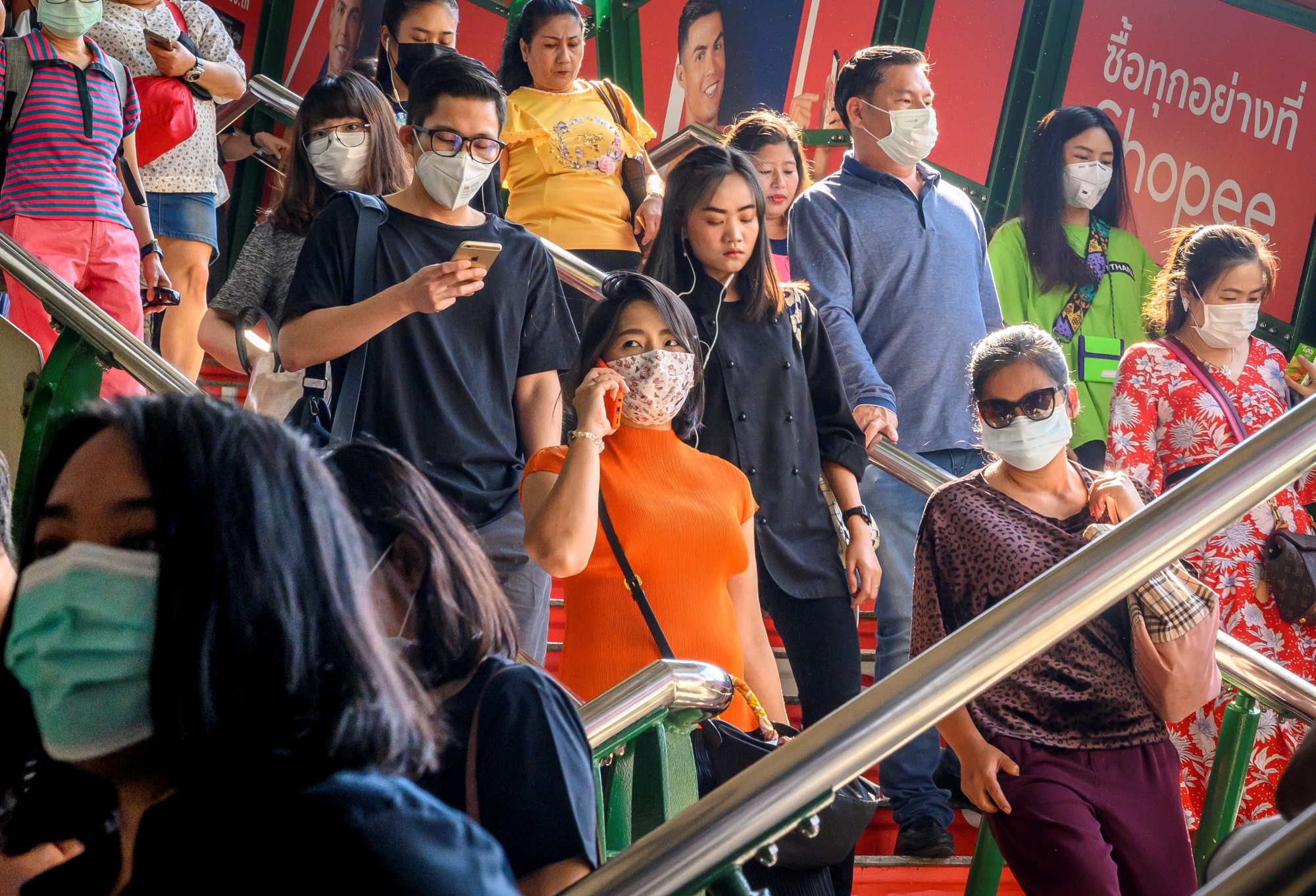 Tourists and commuters in Bangkok on Jan. 28.
