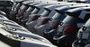 Mitsubishi vehicles bound for shipment sit at a yard in Yokohama, Japan.