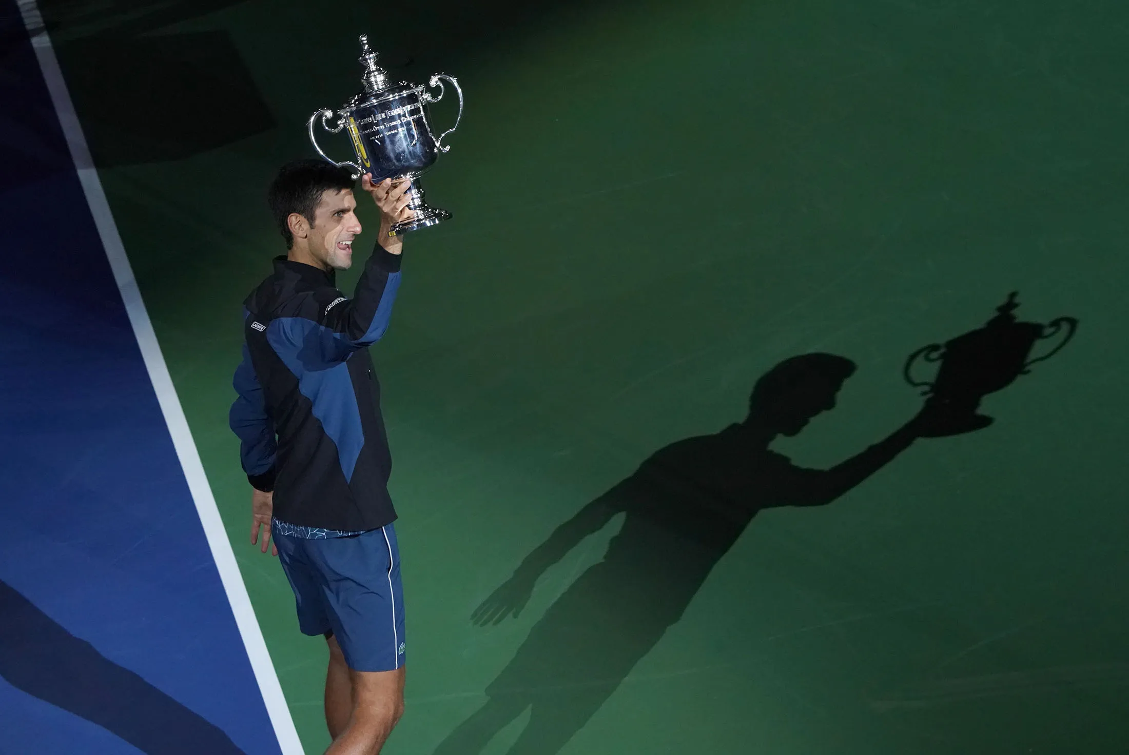Novak Djokovic celebrates his victory over Juan Martin del Potro.