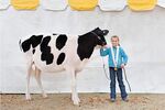 Elizabeth Hill shows off her prize-winning heifer at the World Dairy Expo on Oct. 2