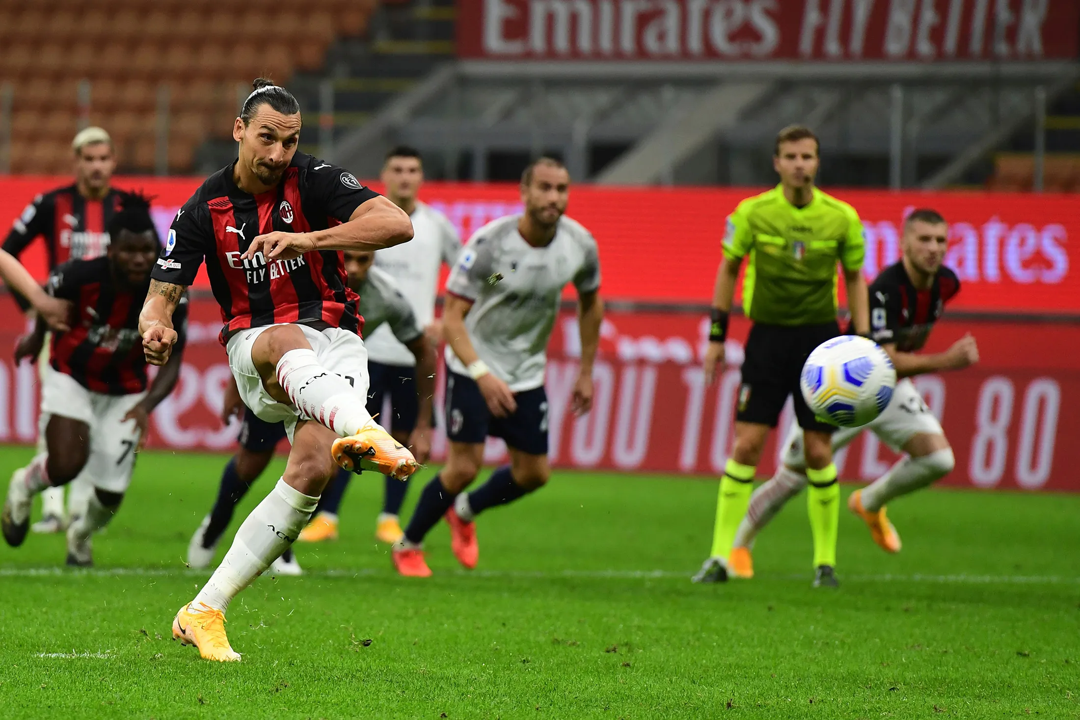 AC Milan’s Zlatan Ibrahimovic scores on a penalty kick during the Italian Serie A football match on Sept. 21.
