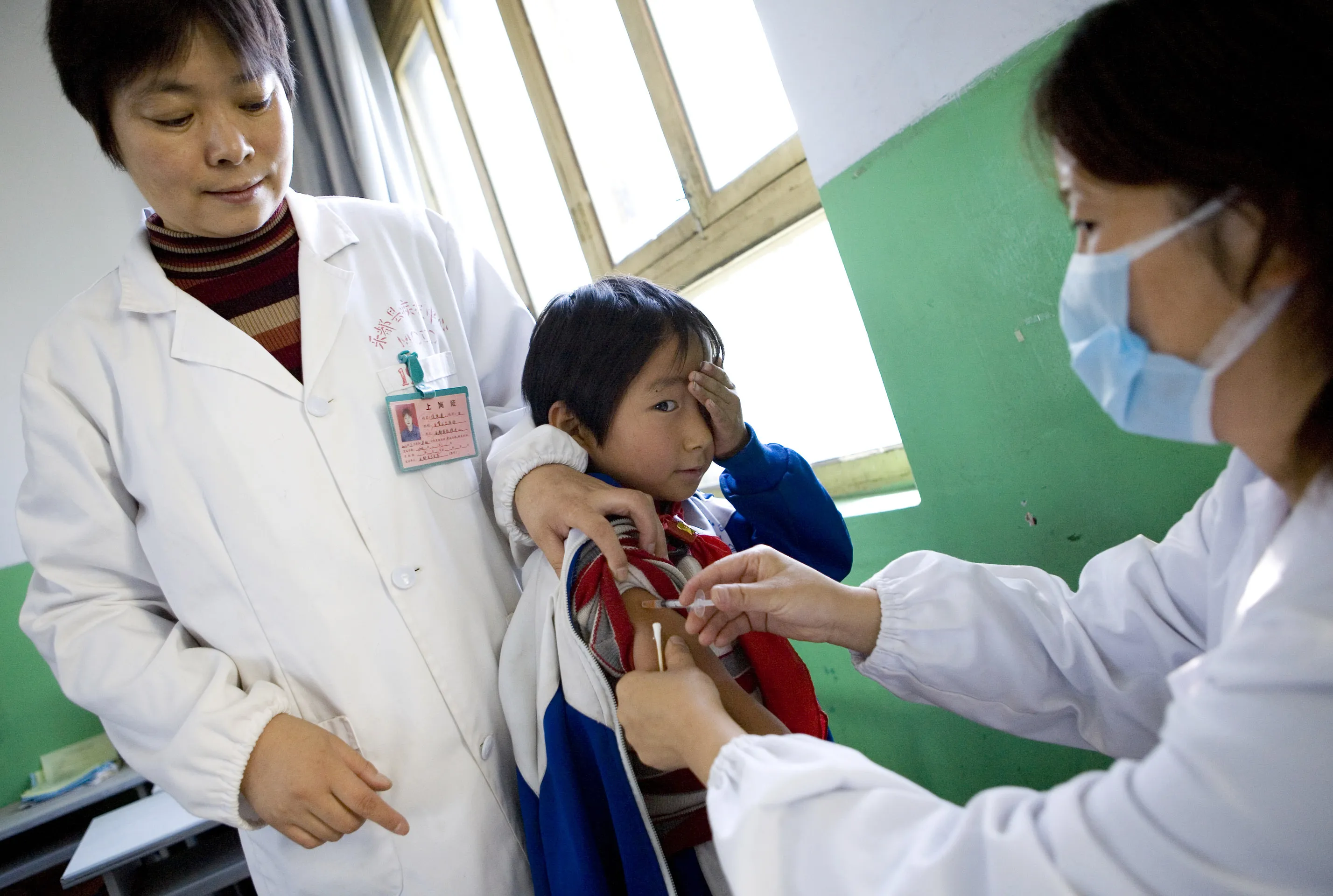A girl receives the vaccination for Hepatitis B in China's Qinghai province.
