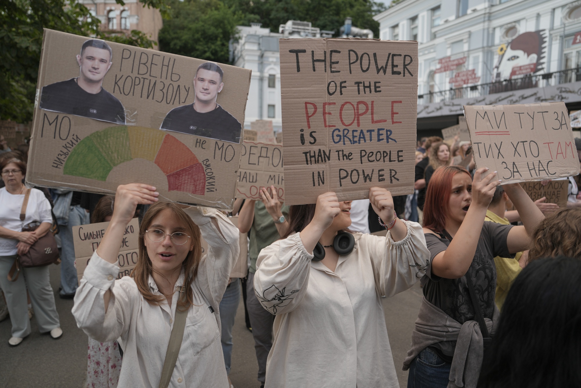 Protesters hold signs during a demonstration in support of former Ukraine Defense Minister Mykhailo Fedorov in Kyiv, Ukraine, on Friday, July 24, 2026. Fedorov rejected all jobs offered to him by President Volodymyr Zelenskyy, saying he would only accept reinstatement to his old position, a move that could breathe new fire into nationwide protests backing him. Photographer: Andrew Kravchenko/Bloomberg