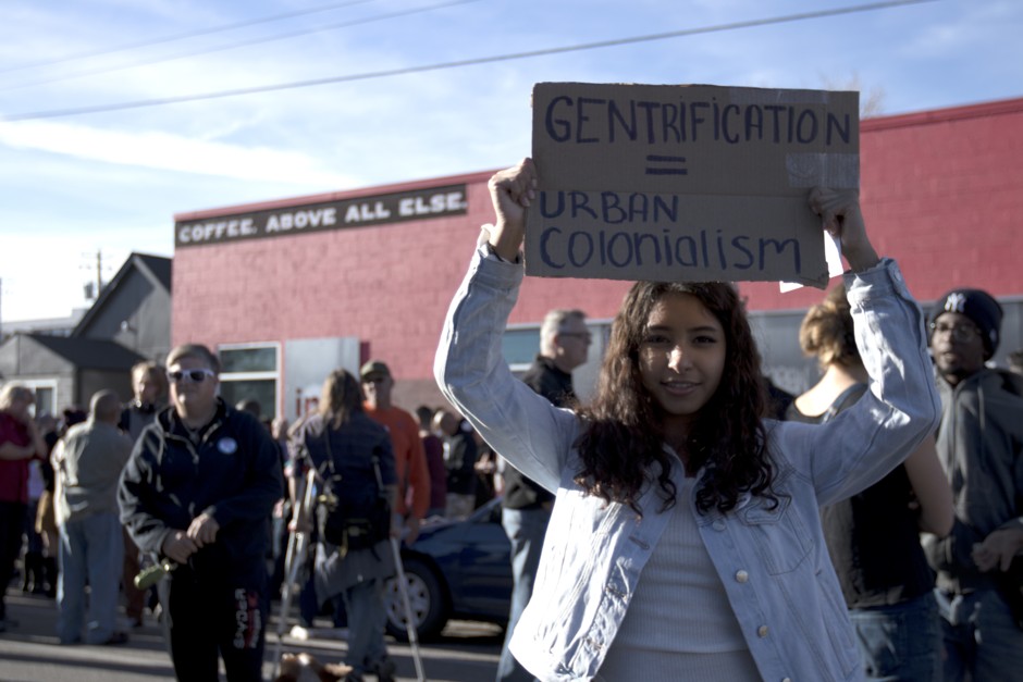 Neighbors protested for days outside ink! Coffee in Five Points, Denver, after a sign joked about gentrification. 
