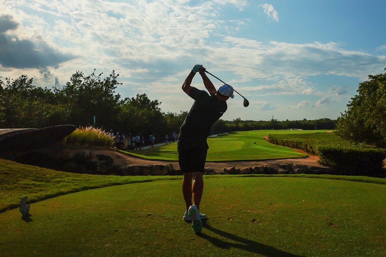 Brooks Koepka plays his shot during a LIV Golf tournament at Mayakoba in Playa del Carmen, Mexico. Photographer: Manuel Velasquez/Getty Images