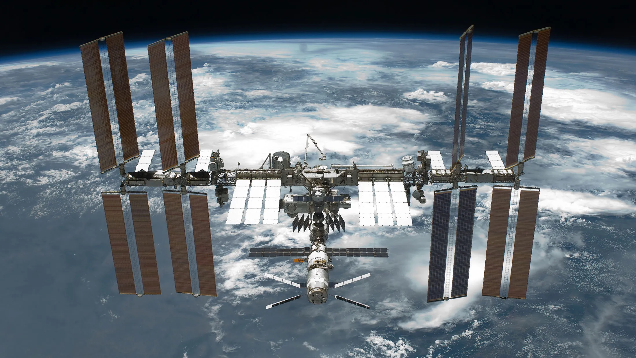 The International Space Station is featured in this image photographed by an STS-134 crew member on the space shuttle Endeavour after the station and shuttle began their post-undocking relative separation.
