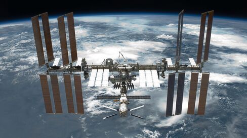 The International Space Station is featured in this image photographed by an STS-134 crew member on the space shuttle Endeavour after the station and shuttle began their post-undocking relative separation.