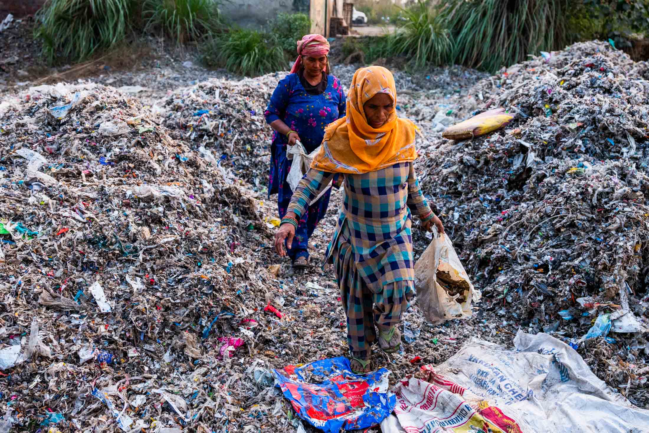 Background Garbage Dump Pollution Garbage Bags With Yellow And