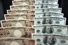 Japanese 10,000 yen banknotes and U.S. one-hundred dollar banknotes