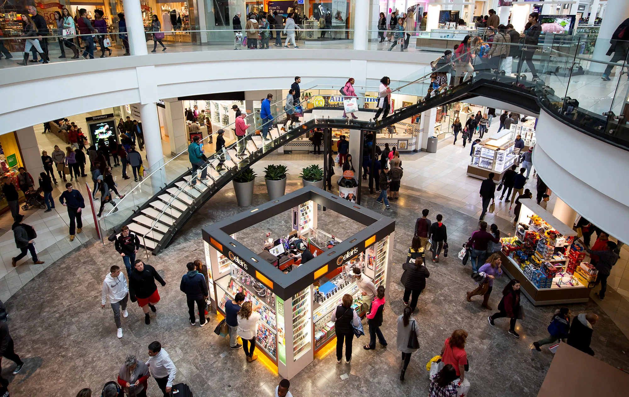 Shoppers walk through the Menlo Park Mall in Edison, New Jersey.
