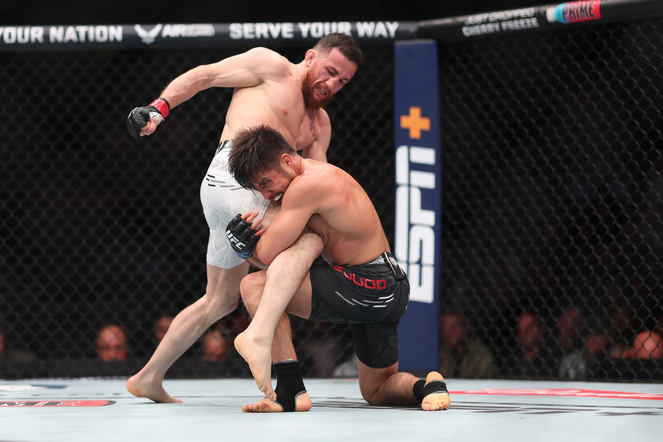 Merab Dvalishvili and Henry Cejudo during their UFC 298 bantamweight fight on Feb. 17.