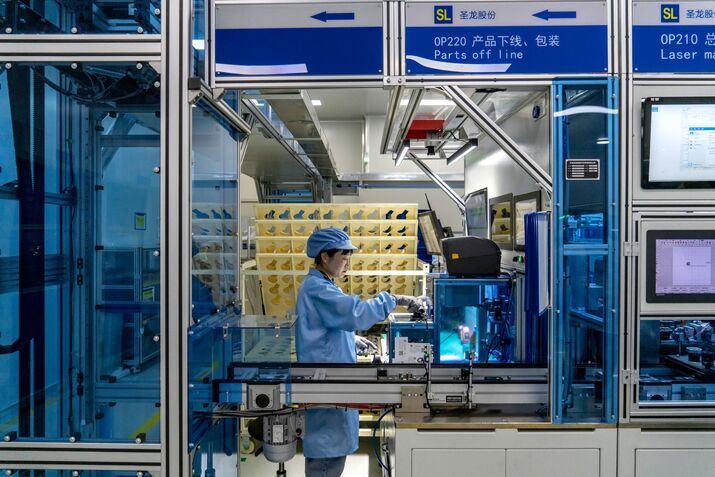 Chinese Economic Momentum Stirs Anew But Slowdown Remains Likely