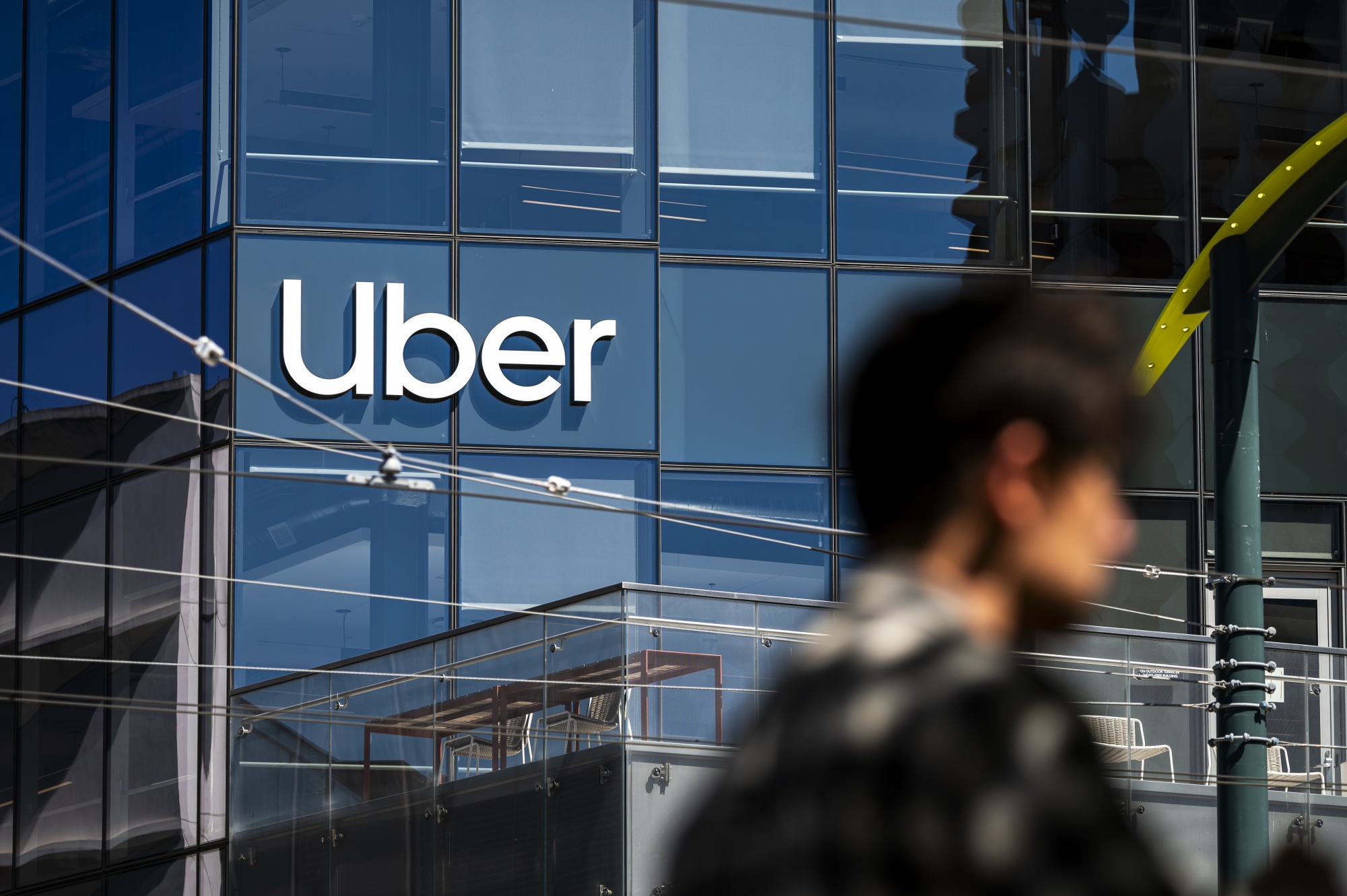 Image associated with story "Uber to Cut 10% of Jobs, or 3,300 Roles, to Slash Bureaucracy"