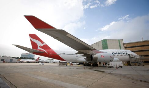 Qantas Faces Domestic Price War as International Losses Widen