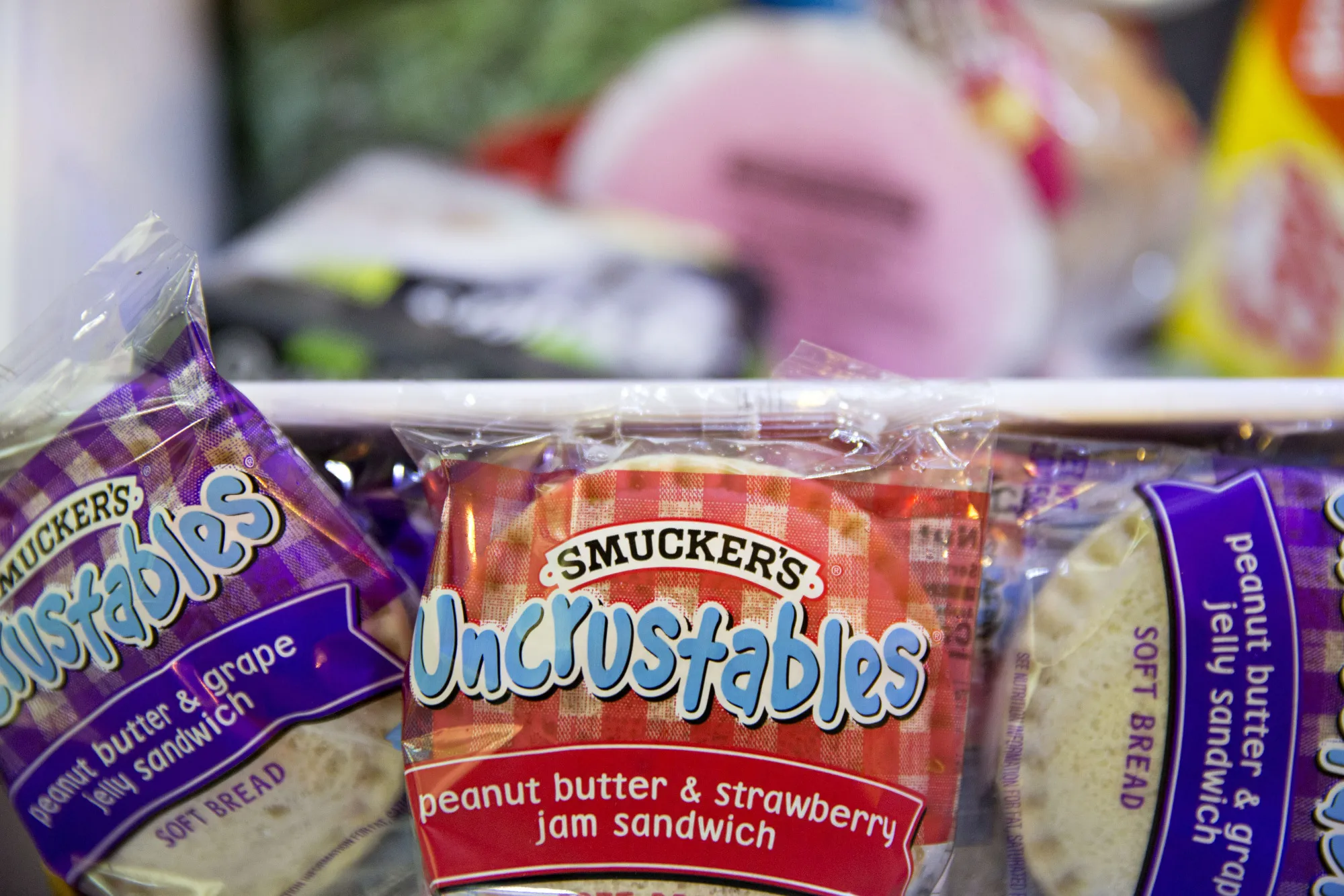 Packages of JM Smucker Co. Smucker's Uncrustables peanut butter and jelly sandwiches.