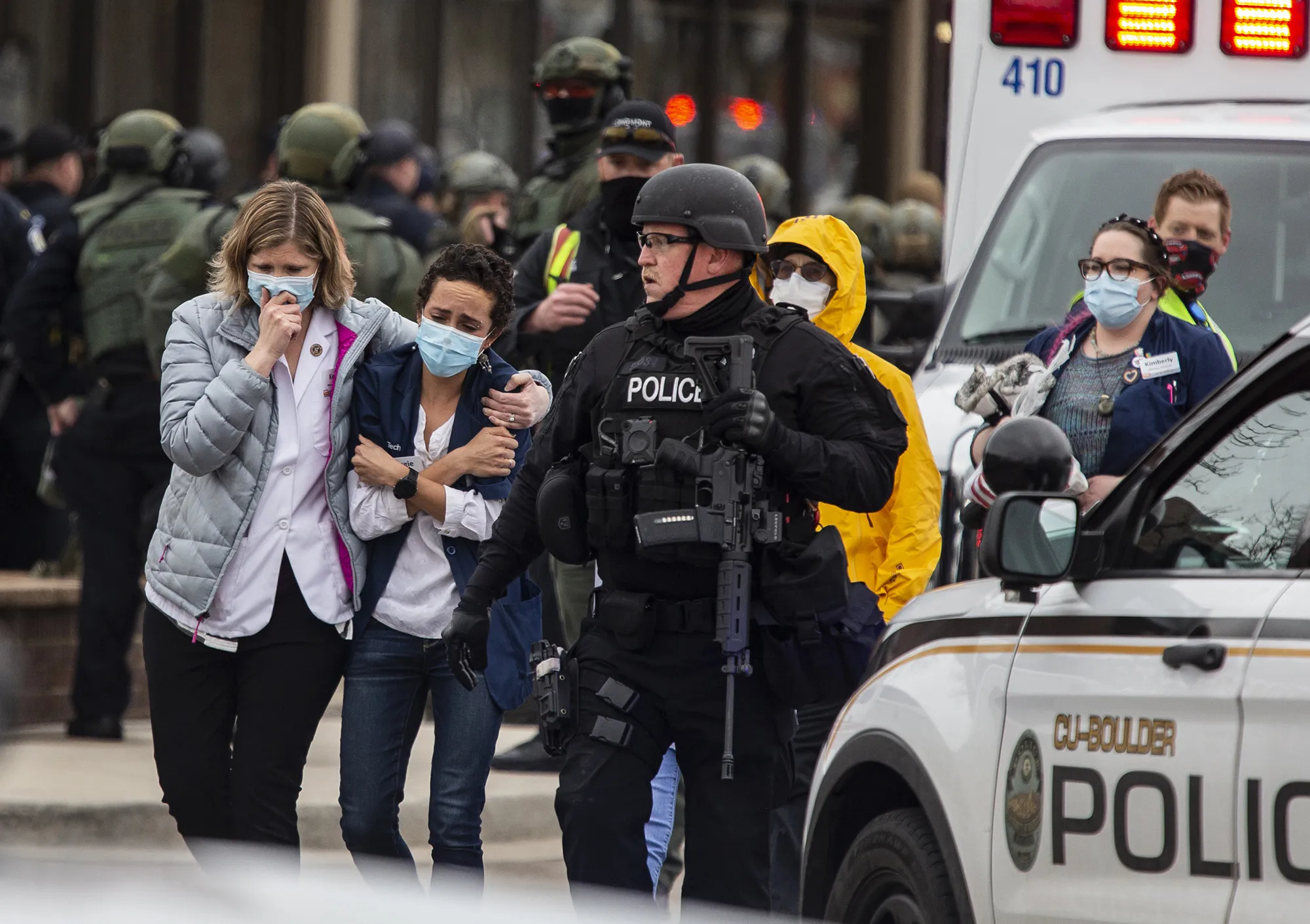 Healthcare workers outside of&nbsp;King Sooper's Grocery store after a gunman opened fire in Boulder, Colorado on March 22.&nbsp;