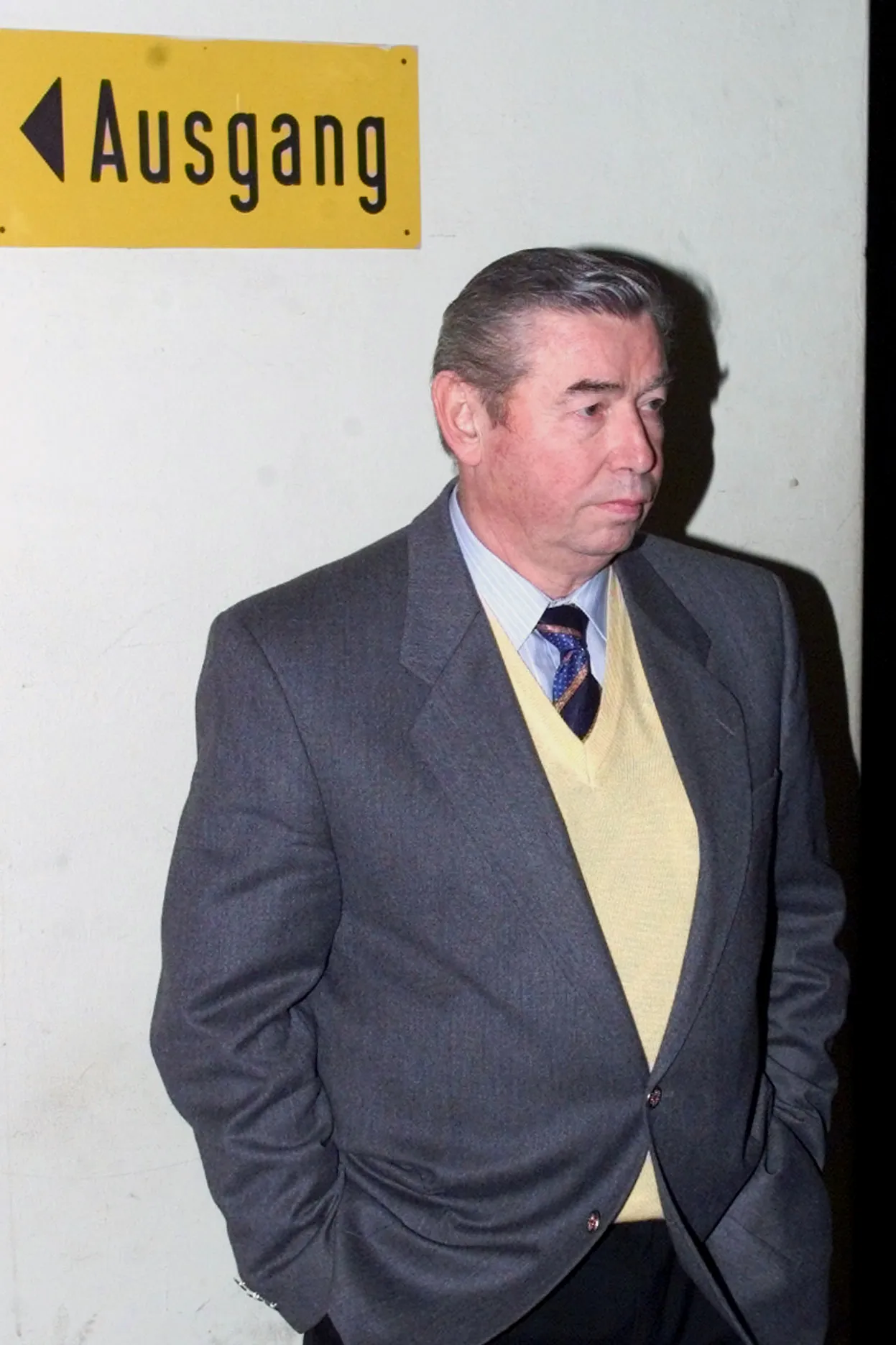 Former Senior Consultant to East Germany's national swimming association Lothar Kipke prior to the trial in a Berlin courtroom on Jan. 12, 2000. The doctor who ran a massive doping program to use steroids on East German swimmers in the 1970s and 1980s has had his award from the sport’s world governing body annulled. Lothar Kipke admitted in a Berlin court in 2000 that he helped design and run a doping system that helped the communist state win dozens of Olympic medals. Kipke was convicted 21 years ago on 58 counts of causing bodily harm. He was given a 15-month suspended jail sentence. (AP Photo/Fritz Reiss, File)