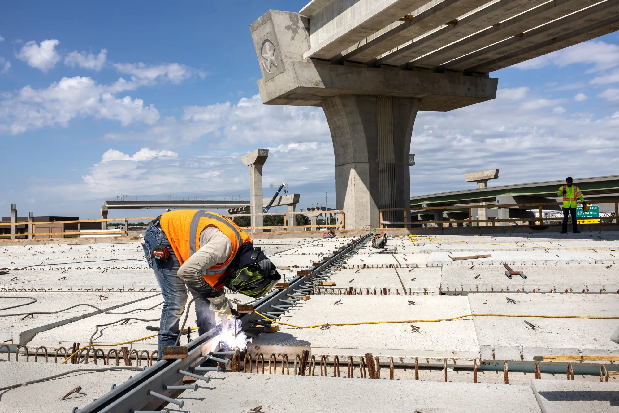 A welder works on an overpass in Irving, Texas.&nbsp;