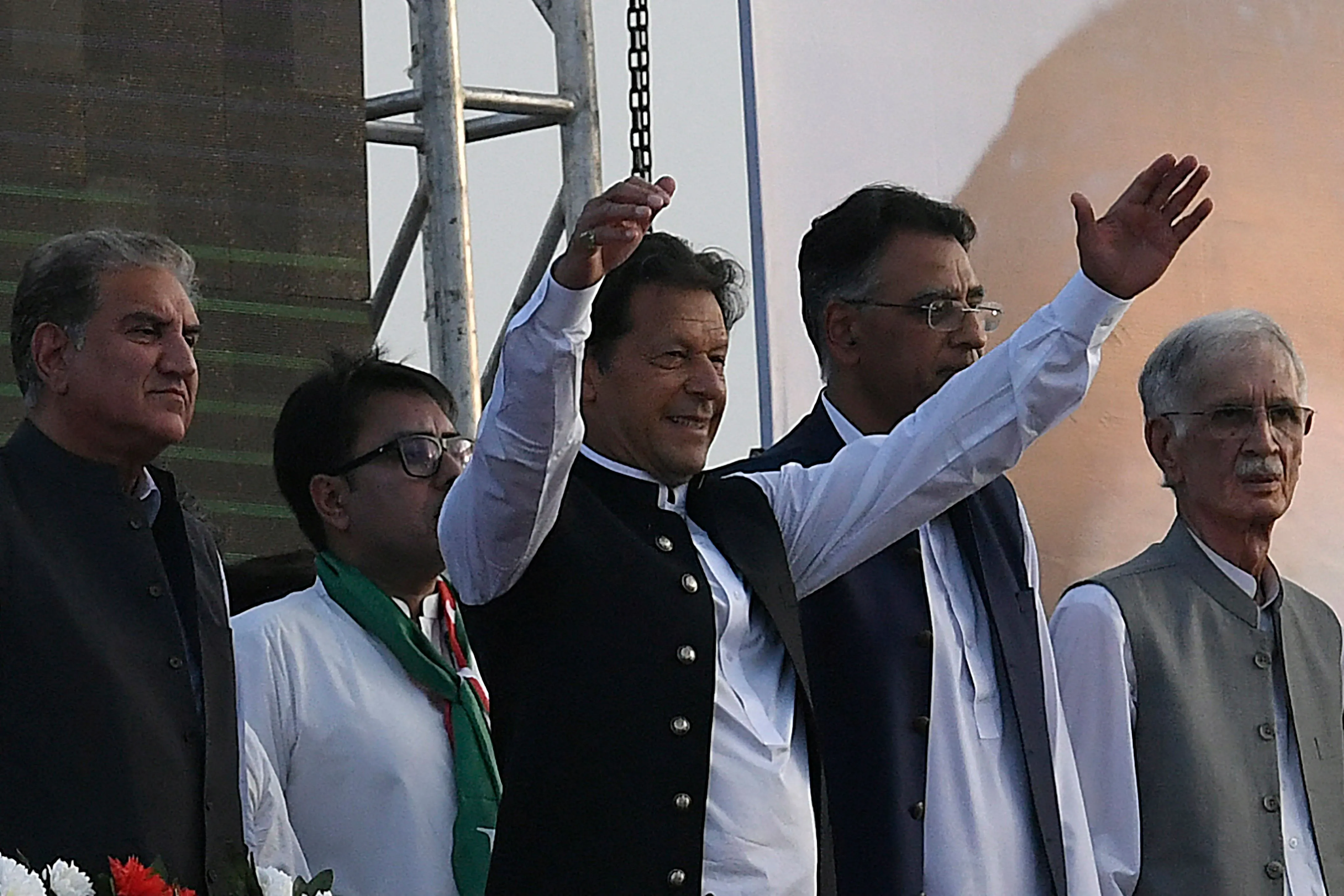 Imran Khan address the supporters of ruling Pakistan Tehreek-e-Insaf (PTI) party during a rally on March 27.