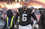 Then-Cleveland Browns quarterback Baker Mayfield (6) walks off the field after an NFL football game, Sunday, Dec. 12, 2021, in Cleveland. The Panthers view their starting QB job as an open competition between the newly acquired Baker Mayfield and incumbent Sam Darnold, one that will ultimately be decided at training camp and in preseason games. (AP Photo/Matt Durisko, File)